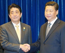 Japanese Prime Minister Shinzo Abe and China's President Xi Jinping
